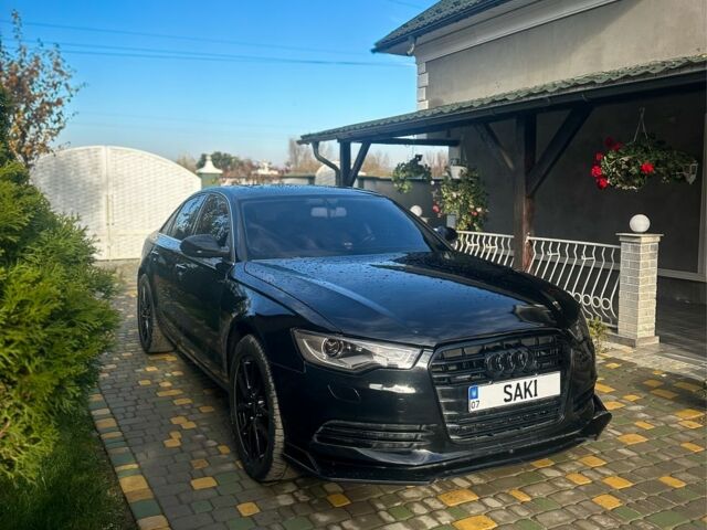 Черный Ауди А6, объемом двигателя 2 л и пробегом 265 тыс. км за 12750 $, фото 1 на Automoto.ua