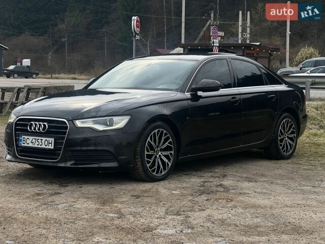 Черный Ауди А6, объемом двигателя 2 л и пробегом 254 тыс. км за 11750 $, фото 1 на Automoto.ua