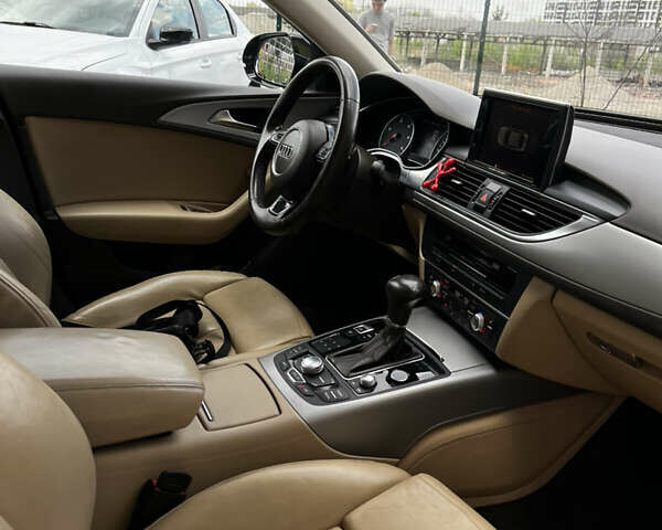 Ауди А6 2012 в Львове на Automoto.ua Черный Ауди А6, объемом двигателя 1.97 л и пробегом 360 тыс. км за 15300 $, фото 38 на Automoto.ua