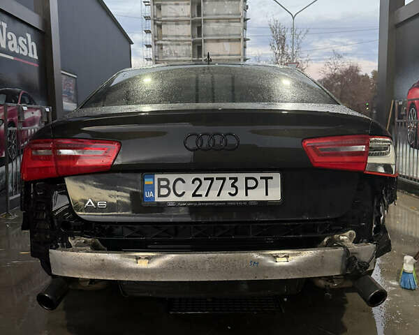 Черный Ауди А6, объемом двигателя 2 л и пробегом 270 тыс. км за 10500 $, фото 1 на Automoto.ua