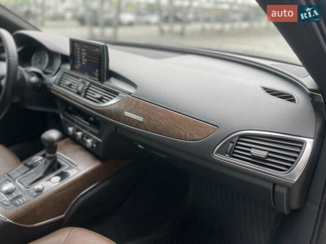 Черный Ауди А6, объемом двигателя 2 л и пробегом 220 тыс. км за 11800 $, фото 17 на Automoto.ua