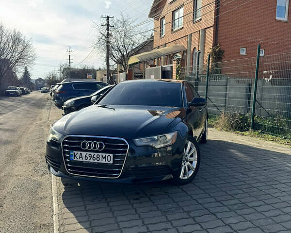 Черный Ауди А6, объемом двигателя 1.98 л и пробегом 189 тыс. км за 10800 $, фото 1 на Automoto.ua