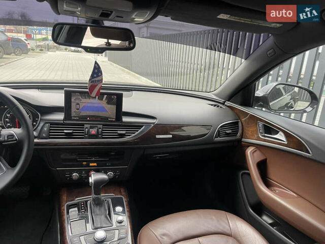 Черный Ауди А6, объемом двигателя 2 л и пробегом 299 тыс. км за 11800 $, фото 23 на Automoto.ua