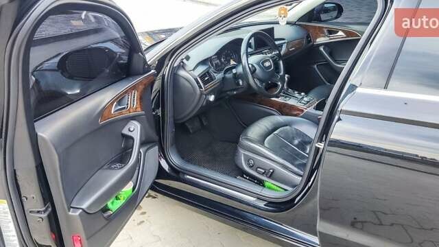 Черный Ауди А6, объемом двигателя 2 л и пробегом 231 тыс. км за 12200 $, фото 2 на Automoto.ua