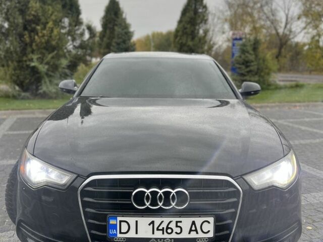 Черный Ауди А6, объемом двигателя 2 л и пробегом 230 тыс. км за 10400 $, фото 1 на Automoto.ua