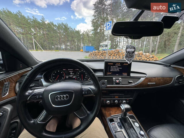 Черный Ауди А6, объемом двигателя 2 л и пробегом 243 тыс. км за 14500 $, фото 16 на Automoto.ua