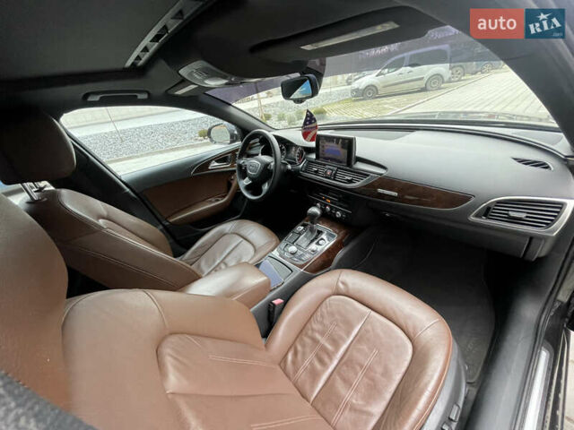 Черный Ауди А6, объемом двигателя 2 л и пробегом 299 тыс. км за 11800 $, фото 27 на Automoto.ua