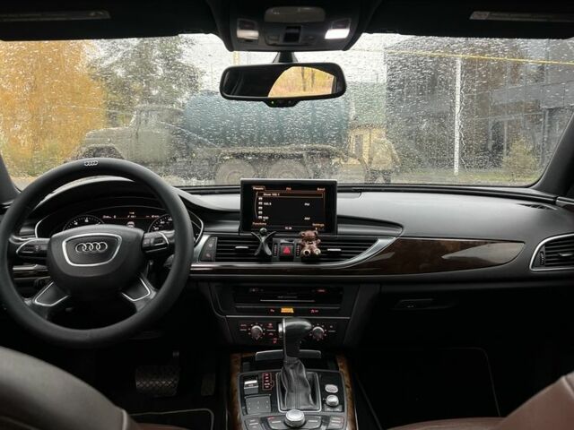 Черный Ауди А6, объемом двигателя 2 л и пробегом 230 тыс. км за 10400 $, фото 7 на Automoto.ua