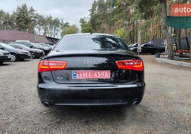 Черный Ауди А6, объемом двигателя 2 л и пробегом 196 тыс. км за 12699 $, фото 4 на Automoto.ua