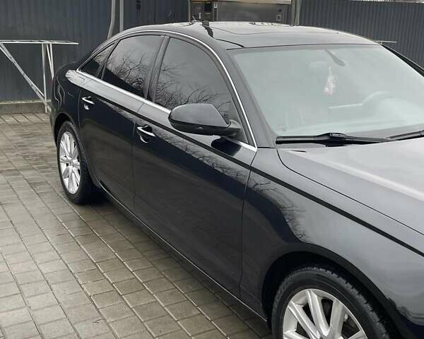 Чорний Ауді А6, об'ємом двигуна 1.98 л та пробігом 235 тис. км за 12800 $, фото 6 на Automoto.ua