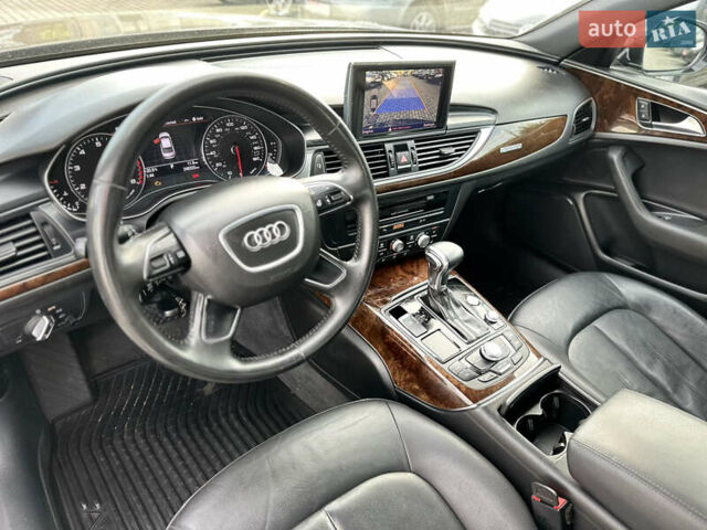 Черный Ауди А6, объемом двигателя 2 л и пробегом 249 тыс. км за 12700 $, фото 13 на Automoto.ua