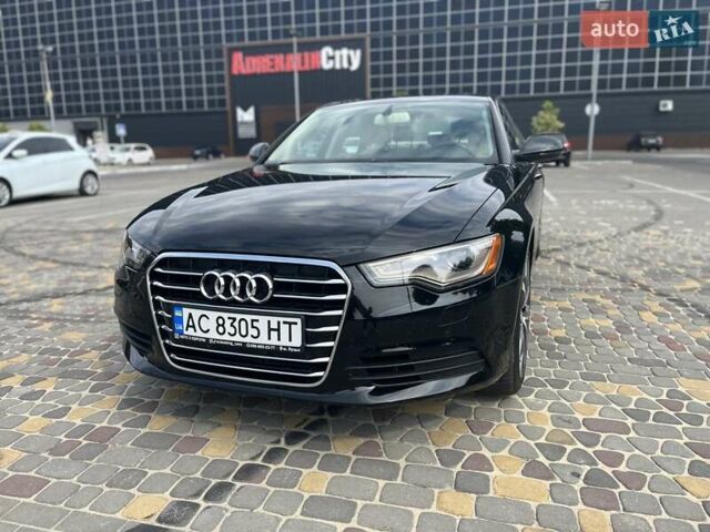 Черный Ауди А6, объемом двигателя 2 л и пробегом 163 тыс. км за 12900 $, фото 1 на Automoto.ua