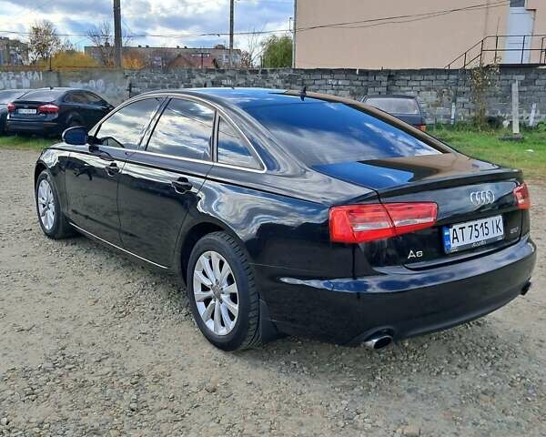 Черный Ауди А6, объемом двигателя 1.98 л и пробегом 205 тыс. км за 12500 $, фото 1 на Automoto.ua