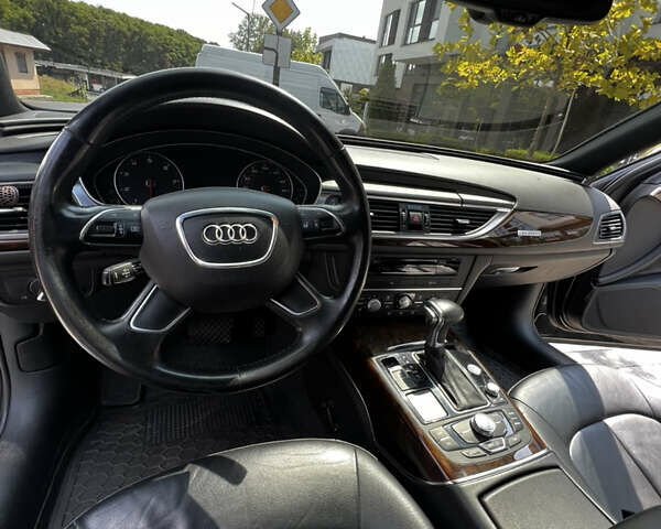 Черный Ауди А6, объемом двигателя 1.98 л и пробегом 203 тыс. км за 14500 $, фото 11 на Automoto.ua