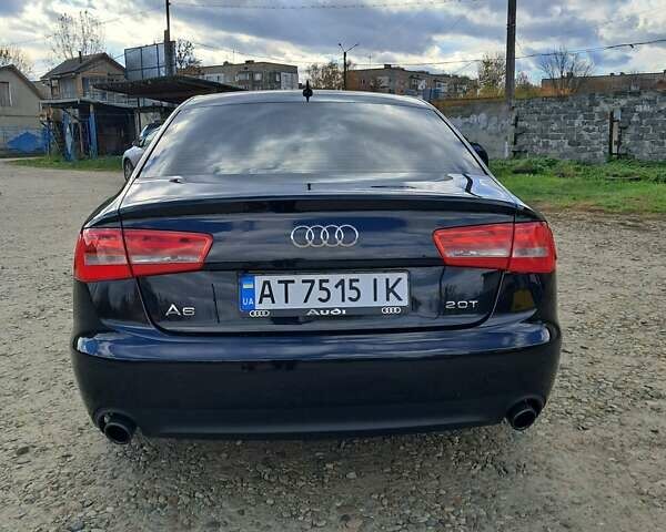 Черный Ауди А6, объемом двигателя 1.98 л и пробегом 205 тыс. км за 12500 $, фото 6 на Automoto.ua