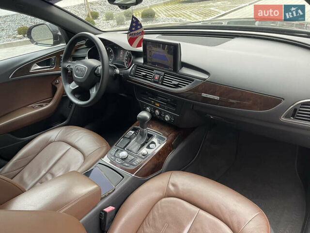 Черный Ауди А6, объемом двигателя 2 л и пробегом 299 тыс. км за 11800 $, фото 26 на Automoto.ua