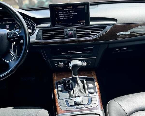 Черный Ауди А6, объемом двигателя 2 л и пробегом 182 тыс. км за 15400 $, фото 1 на Automoto.ua