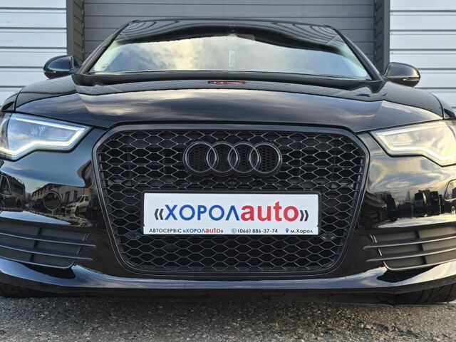 Черный Ауди А6, объемом двигателя 2 л и пробегом 172 тыс. км за 14900 $, фото 2 на Automoto.ua