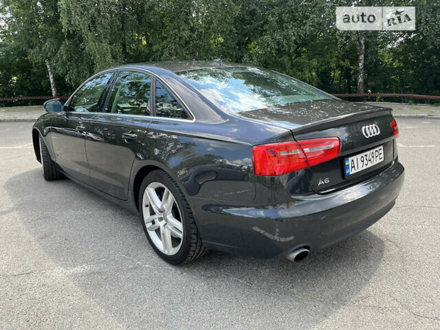 Черный Ауди А6, объемом двигателя 1.98 л и пробегом 168 тыс. км за 15000 $, фото 1 на Automoto.ua