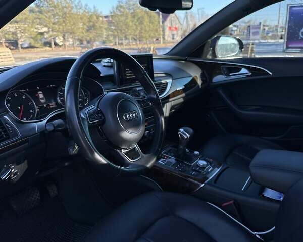 Черный Ауди А6, объемом двигателя 1.98 л и пробегом 184 тыс. км за 15300 $, фото 9 на Automoto.ua