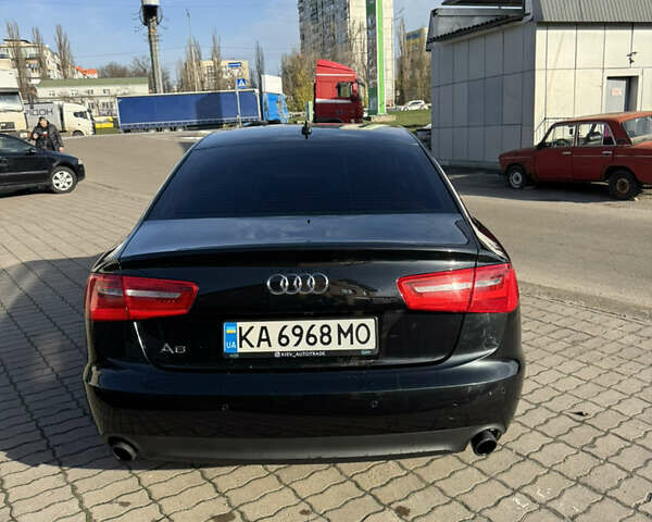 Черный Ауди А6, объемом двигателя 1.98 л и пробегом 189 тыс. км за 10800 $, фото 7 на Automoto.ua