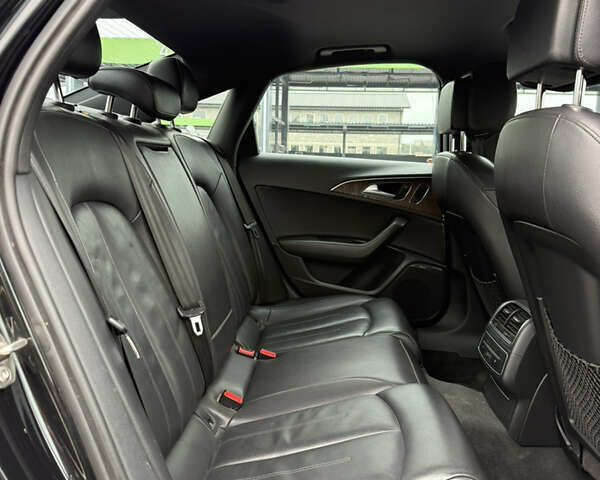 Черный Ауди А6, объемом двигателя 1.98 л и пробегом 296 тыс. км за 12500 $, фото 15 на Automoto.ua