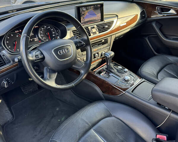 Черный Ауди А6, объемом двигателя 1.98 л и пробегом 189 тыс. км за 10800 $, фото 14 на Automoto.ua