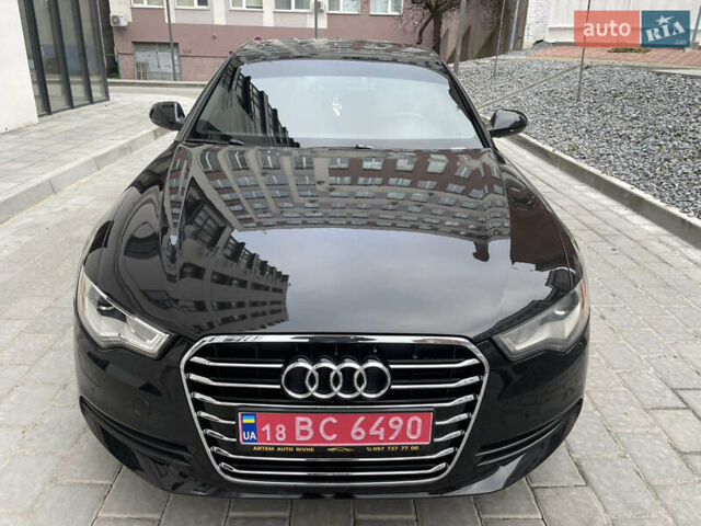 Черный Ауди А6, объемом двигателя 2 л и пробегом 299 тыс. км за 11800 $, фото 1 на Automoto.ua
