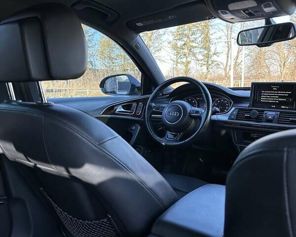 Черный Ауди А6, объемом двигателя 1.98 л и пробегом 184 тыс. км за 15300 $, фото 12 на Automoto.ua