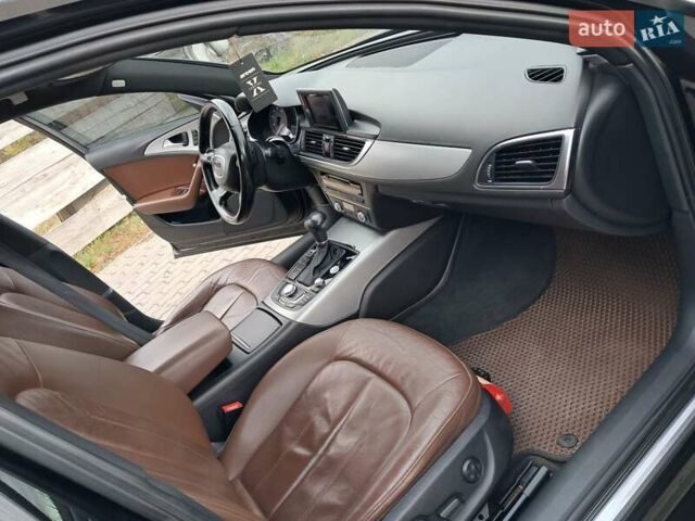 Черный Ауди А6, объемом двигателя 1.98 л и пробегом 205 тыс. км за 12500 $, фото 15 на Automoto.ua
