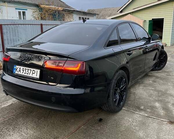 Черный Ауди А6, объемом двигателя 1.97 л и пробегом 311 тыс. км за 14700 $, фото 3 на Automoto.ua