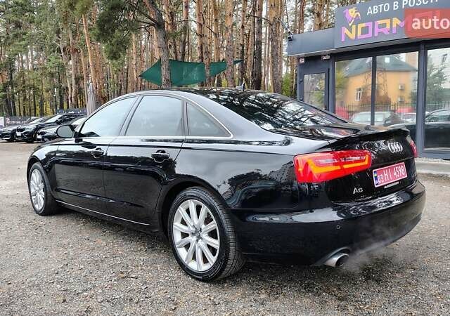 Черный Ауди А6, объемом двигателя 2 л и пробегом 196 тыс. км за 12699 $, фото 3 на Automoto.ua