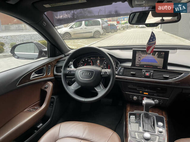 Черный Ауди А6, объемом двигателя 2 л и пробегом 299 тыс. км за 11800 $, фото 22 на Automoto.ua