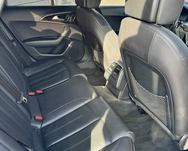 Черный Ауди А6, объемом двигателя 1.98 л и пробегом 189 тыс. км за 10800 $, фото 10 на Automoto.ua