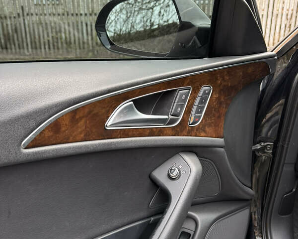 Чорний Ауді А6, об'ємом двигуна 1.97 л та пробігом 211 тис. км за 14900 $, фото 4 на Automoto.ua