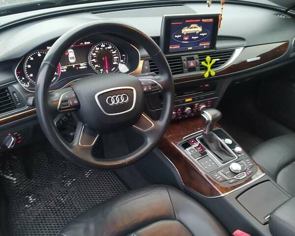 Черный Ауди А6, объемом двигателя 1.98 л и пробегом 173 тыс. км за 15800 $, фото 8 на Automoto.ua