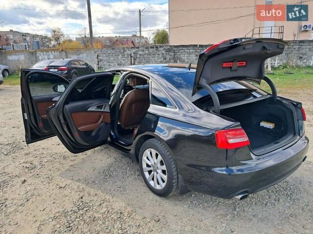 Черный Ауди А6, объемом двигателя 1.98 л и пробегом 205 тыс. км за 12500 $, фото 4 на Automoto.ua
