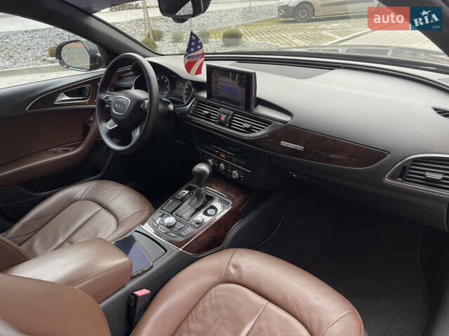 Черный Ауди А6, объемом двигателя 2 л и пробегом 299 тыс. км за 11800 $, фото 25 на Automoto.ua