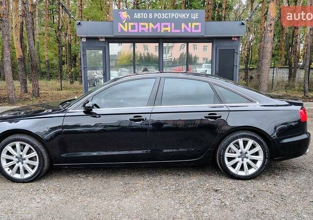 Черный Ауди А6, объемом двигателя 2 л и пробегом 196 тыс. км за 12699 $, фото 2 на Automoto.ua