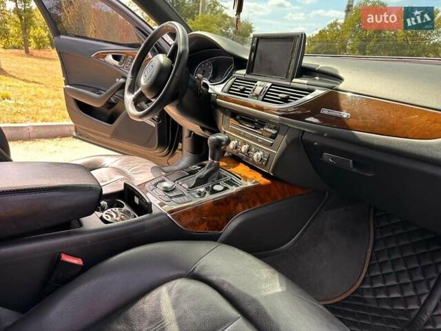 Черный Ауди А6, объемом двигателя 1.98 л и пробегом 278 тыс. км за 13000 $, фото 4 на Automoto.ua