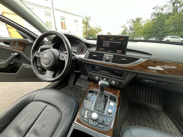 Черный Ауди А6, объемом двигателя 1.98 л и пробегом 168 тыс. км за 15000 $, фото 2 на Automoto.ua