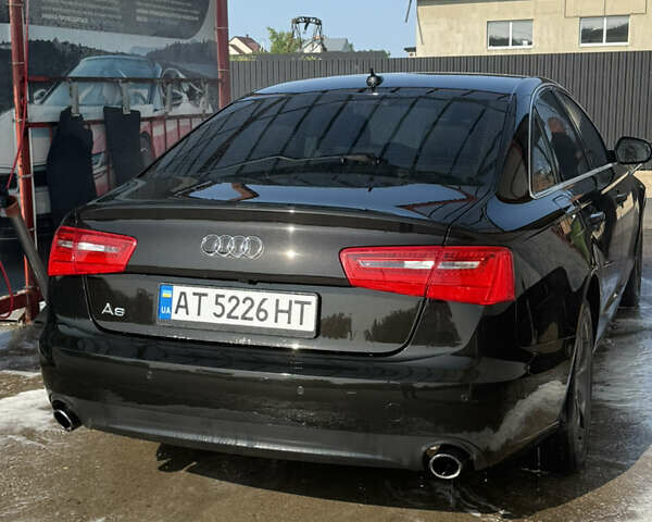 Черный Ауди А6, объемом двигателя 1.98 л и пробегом 150 тыс. км за 14400 $, фото 2 на Automoto.ua
