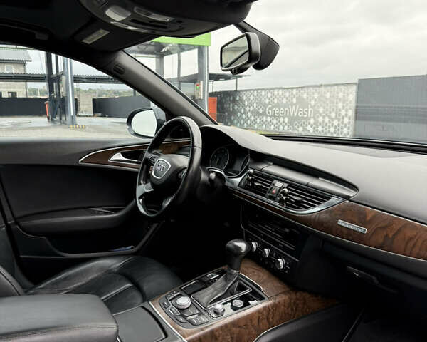 Черный Ауди А6, объемом двигателя 1.98 л и пробегом 296 тыс. км за 12500 $, фото 19 на Automoto.ua