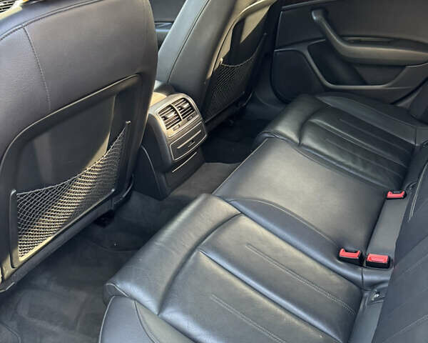 Черный Ауди А6, объемом двигателя 1.98 л и пробегом 189 тыс. км за 10800 $, фото 12 на Automoto.ua