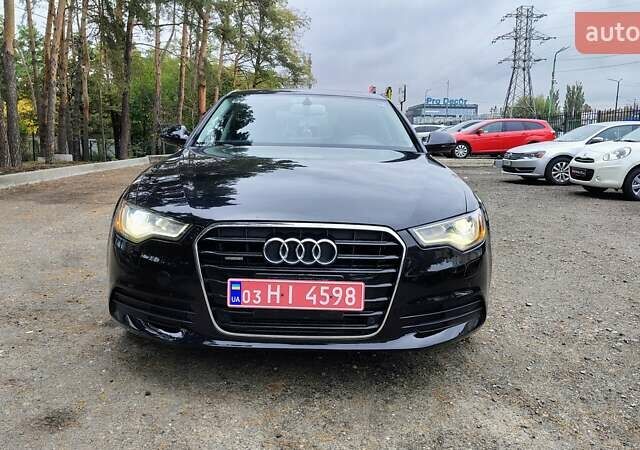 Черный Ауди А6, объемом двигателя 2 л и пробегом 196 тыс. км за 12699 $, фото 1 на Automoto.ua