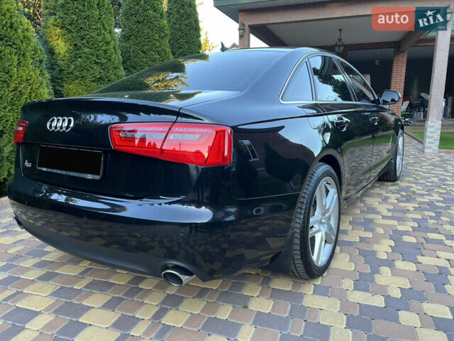Черный Ауди А6, объемом двигателя 1.98 л и пробегом 89 тыс. км за 16800 $, фото 12 на Automoto.ua