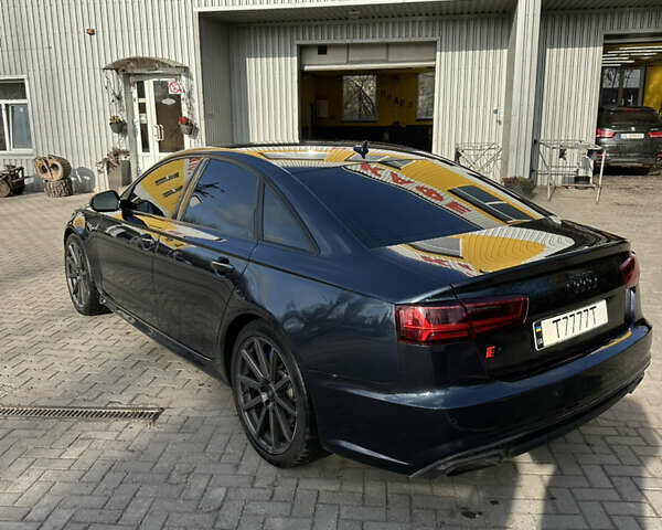 Черный Ауди А6, объемом двигателя 2 л и пробегом 310 тыс. км за 16000 $, фото 4 на Automoto.ua