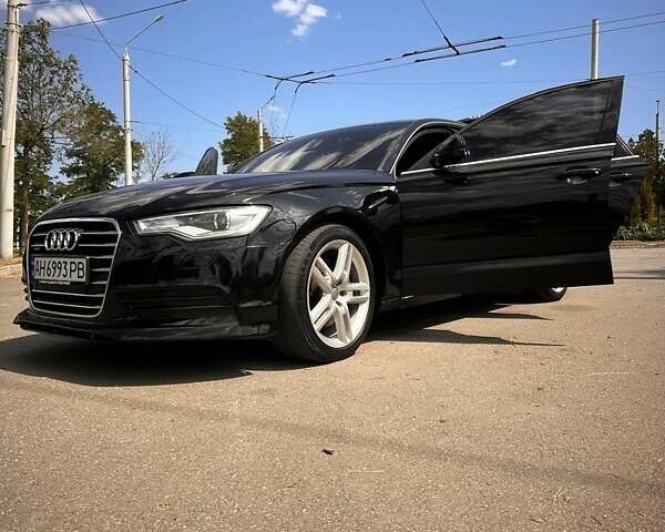 Чорний Ауді А6, об'ємом двигуна 1.98 л та пробігом 277 тис. км за 13500 $, фото 1 на Automoto.ua
