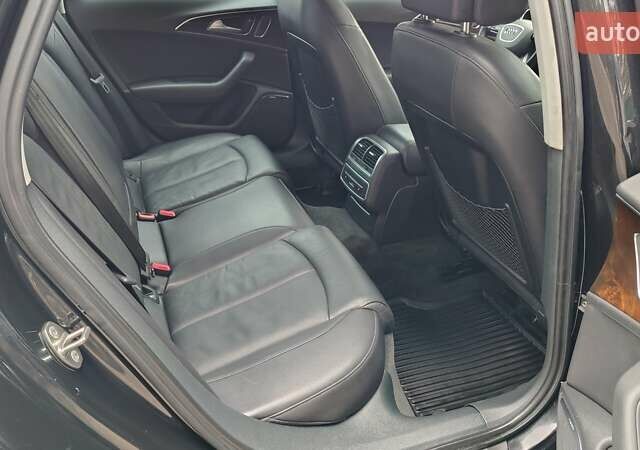 Черный Ауди А6, объемом двигателя 2 л и пробегом 196 тыс. км за 12699 $, фото 12 на Automoto.ua