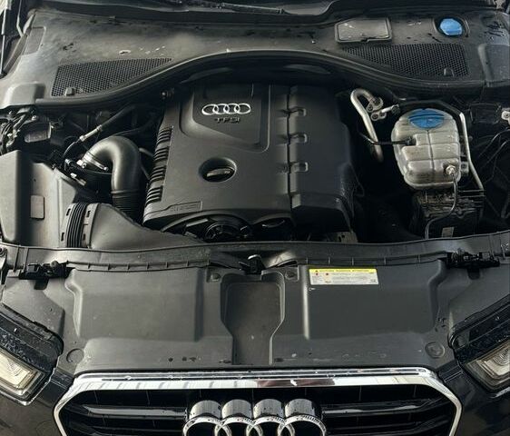 Черный Ауди А6, объемом двигателя 2 л и пробегом 210 тыс. км за 13300 $, фото 3 на Automoto.ua